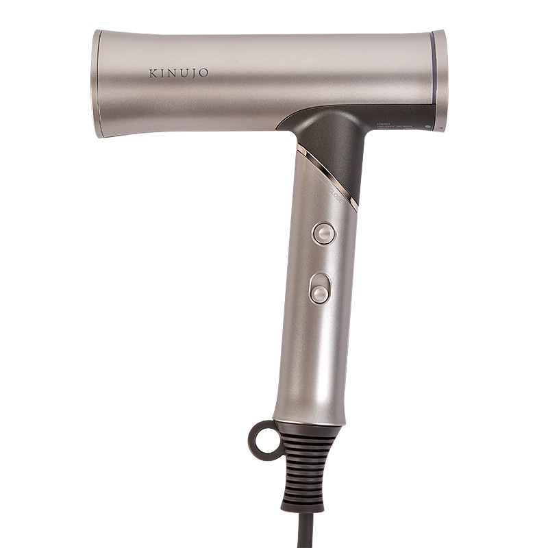 KINUJO Voyage hair dryer in a metallic finish shown from the side with the handle and control buttons visible.