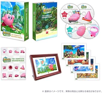 Product photo mockup of 星のカービィ ディスカバリー コンプリートサウンドトラック boxed CD set showing the outer sleeve, case, discs, booklet, framed art print, and character stickers.