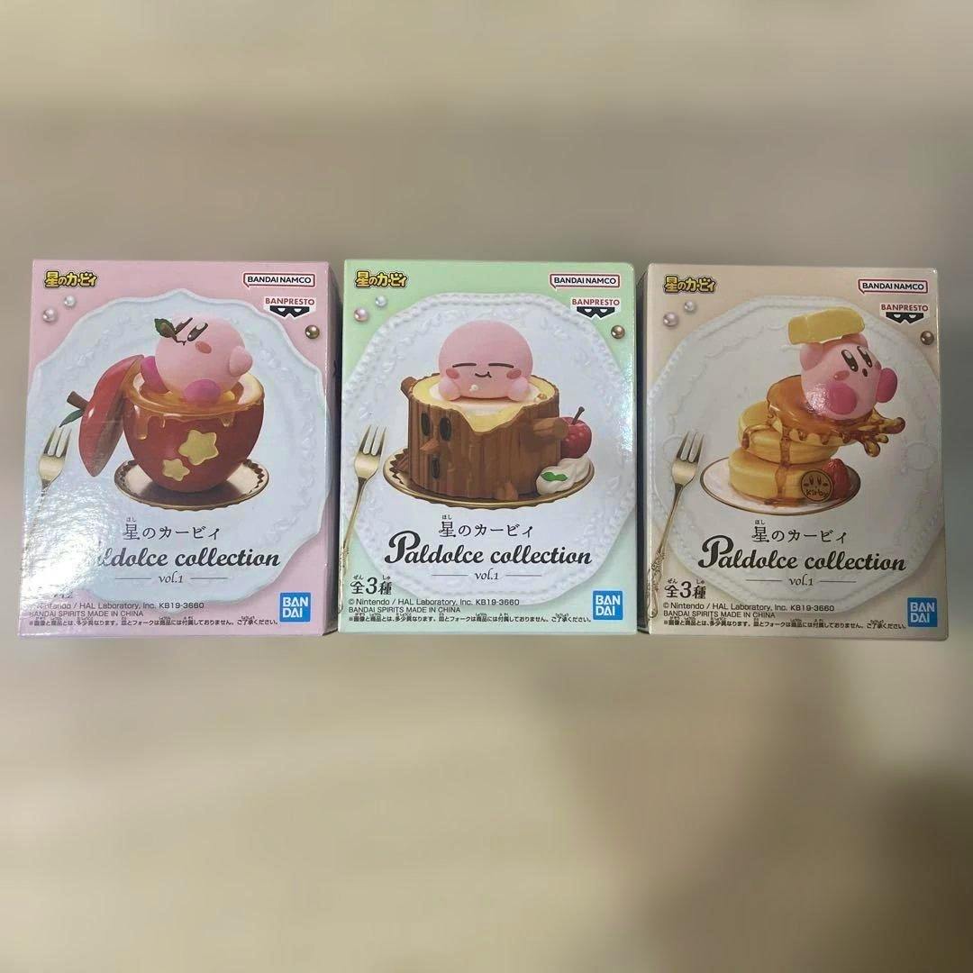 Three boxed Kirby Paldolce Collection vol.1 figure boxes shown side-by-side with the front artwork visible.