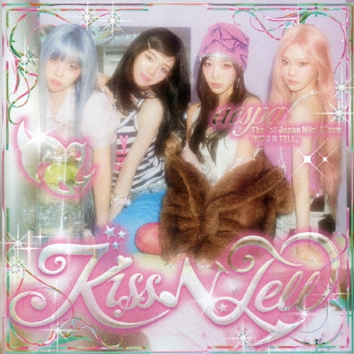 CD front cover artwork showing four women posing with the "Kiss N Tell" title and pink decorative elements.