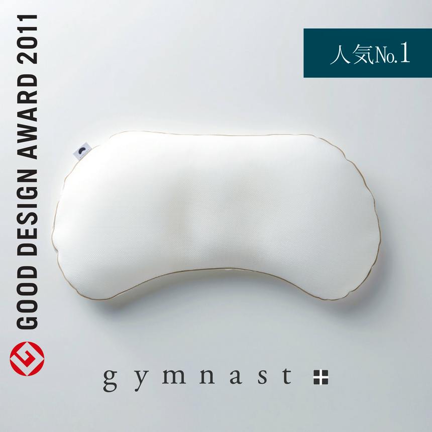 A white, broad-bean-shaped sleeping support pillow displayed on a light background.