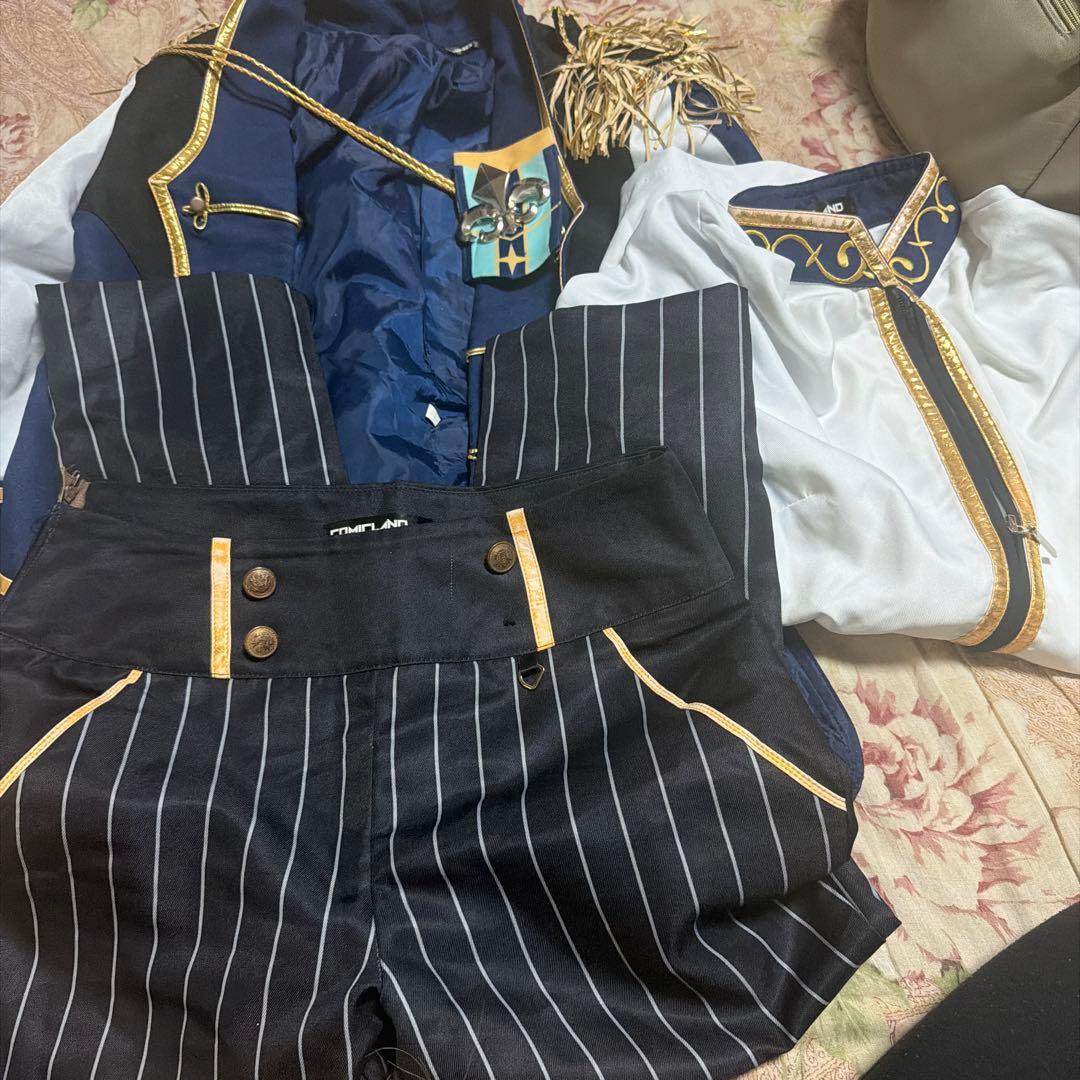 Men's "Knights" cosplay suit laid out, showing a navy jacket, white shirt, and striped pants.