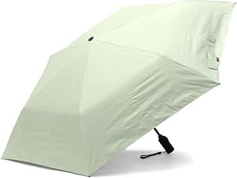 A wasabi-colored Knirps U.220 compact umbrella opened with its black handle and wrist strap visible.