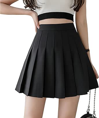 Front view of a black pleated women's mini skirt worn by a model, showing the pleats and waistband.
