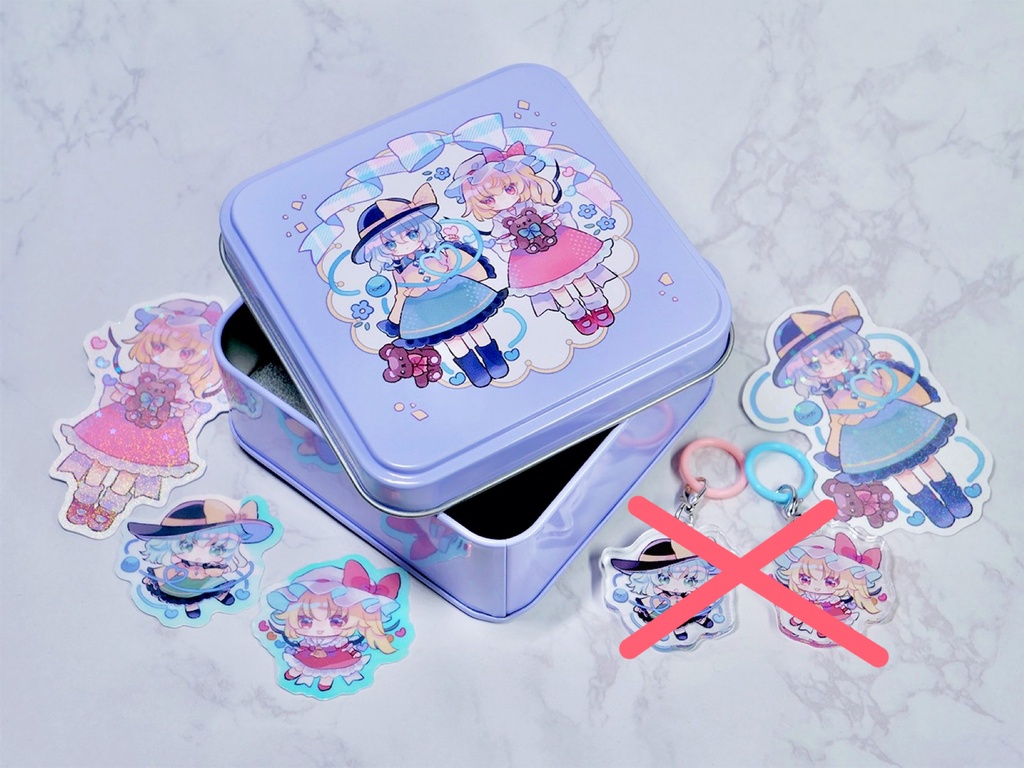 A square lavender aluminum tin (empty can) with illustrated character cutouts arranged around it and two small charms marked with a red X.