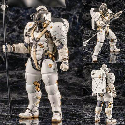 Front, posed, and rear views of the white Ludens plastic model figure by Kotobukiya holding a staff on a dark textured display surface.