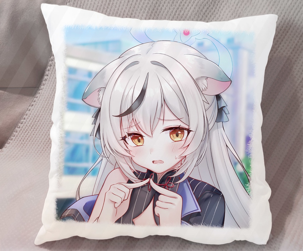 A small square cushion showing a printed illustration of a white-haired anime girl on the front.