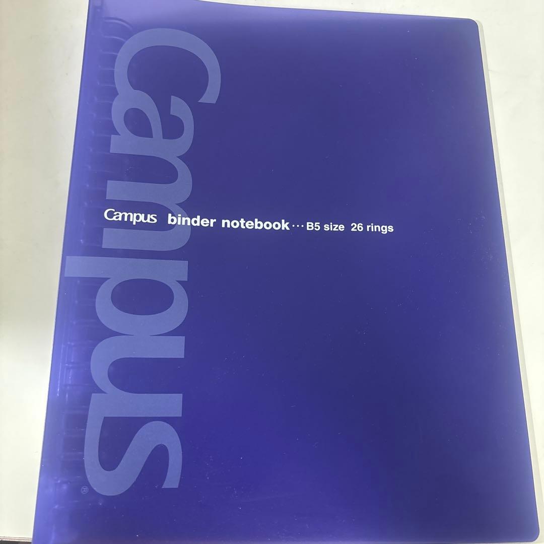 Purple Campus B5-size loose-leaf binder with "Campus binder notebook ... B5 size 26 rings" printed on the front cover.