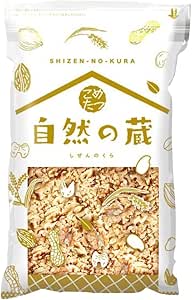 White package of Komatatsu raw walnuts with a clear window showing shelled walnut pieces.