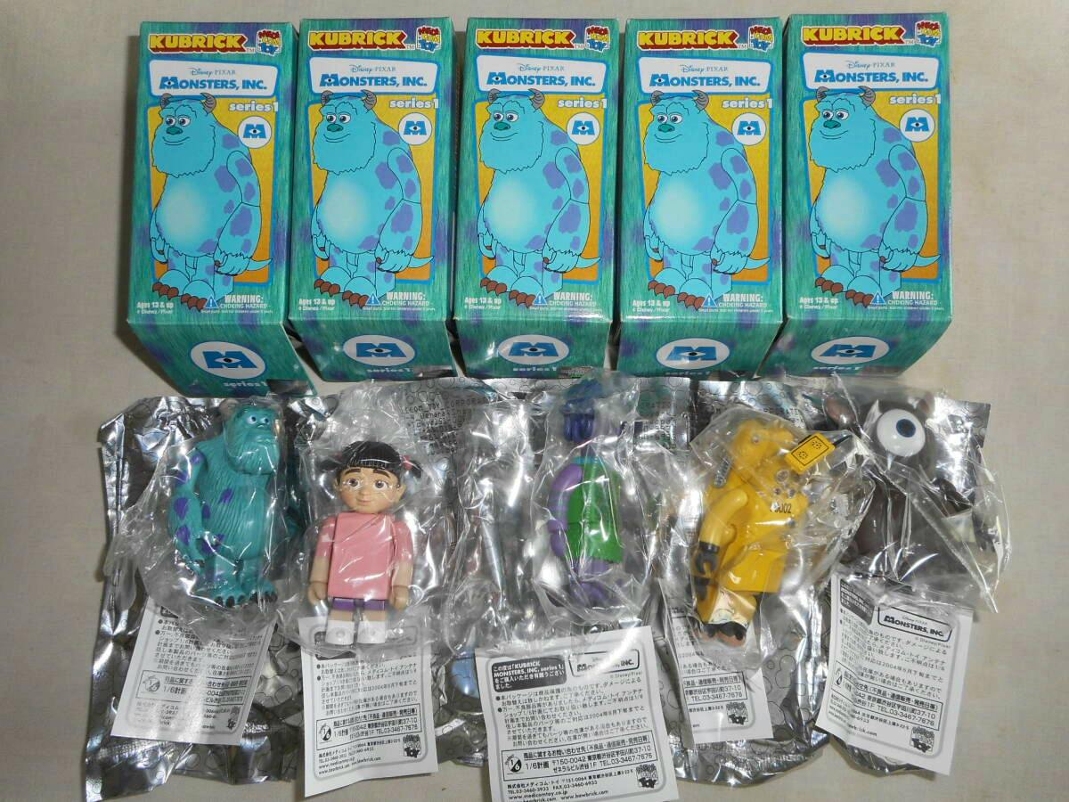 Five KUBRICK Monsters, Inc. series 1 boxes lined across the top with the five corresponding plastic collectible figures sealed in bags displayed below.