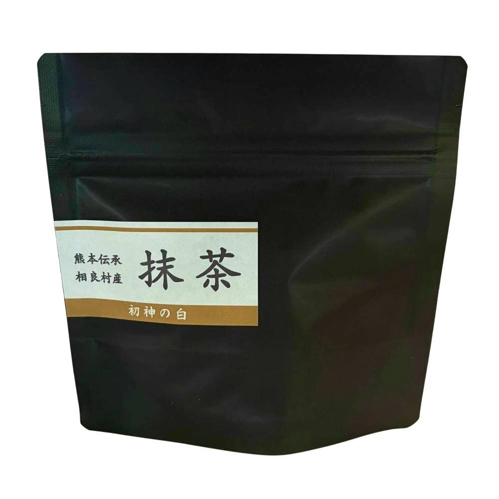 A black resealable stand-up pouch of matcha green tea with a label reading 初神の白.