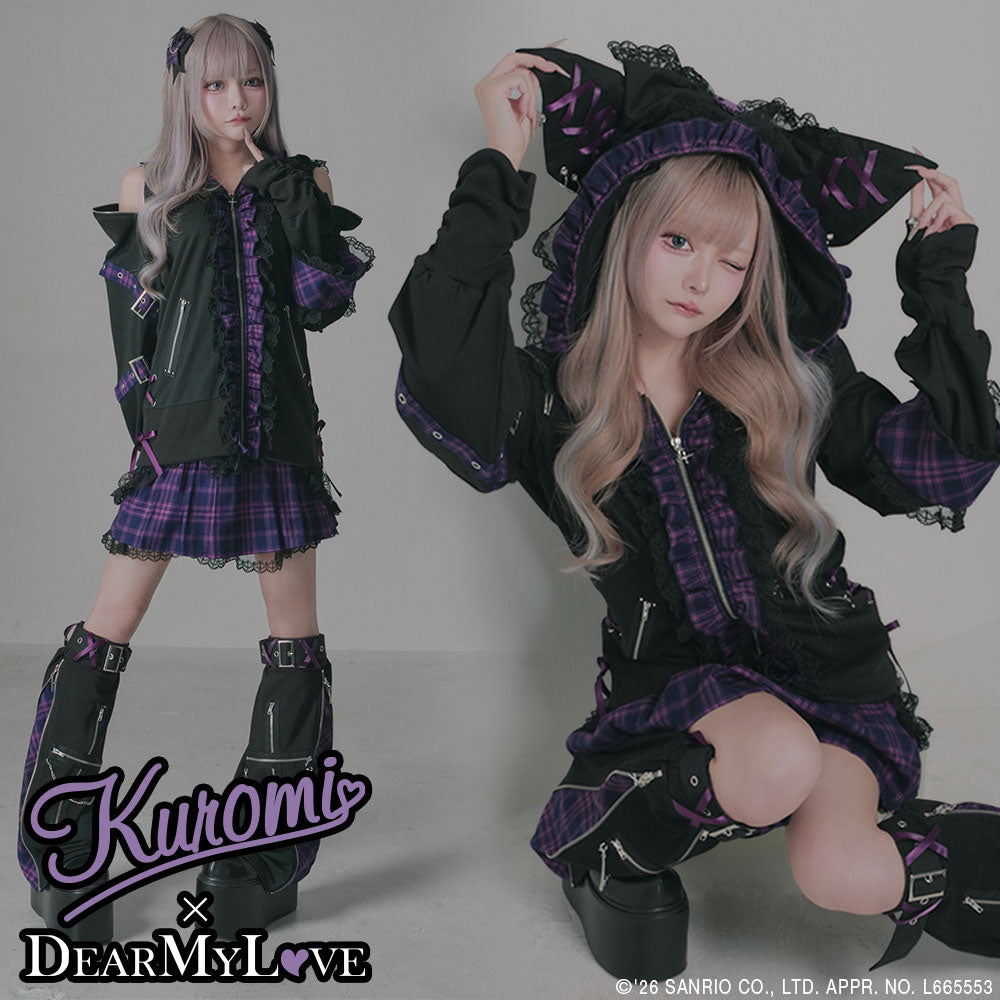Model wearing the ear-attached lace-up hooded women's jacket (black with purple plaid accents) shown standing and kneeling.