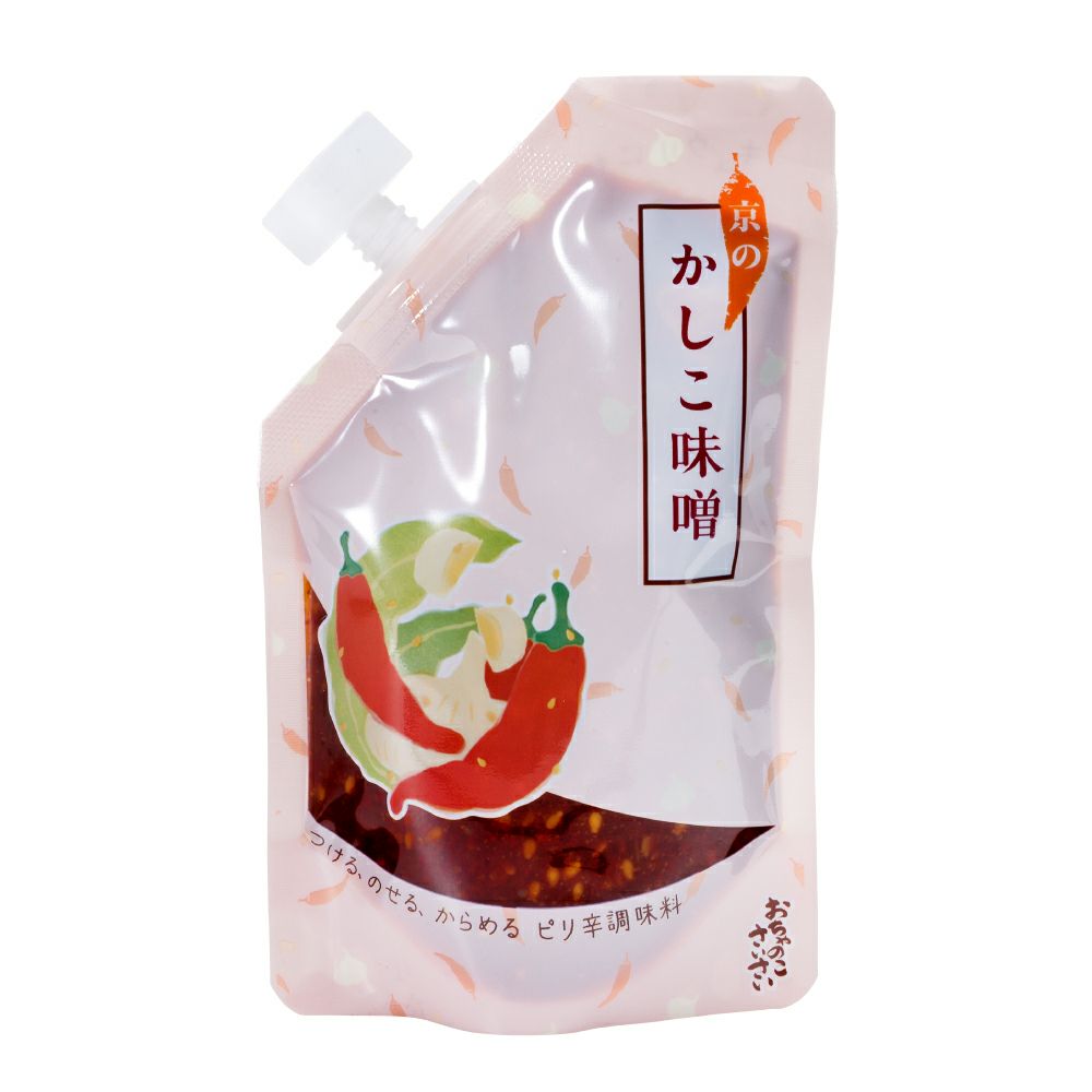 Pink spouted pouch of the rice seasoning "京のかしこ味噌" showing chili illustrations and product label.