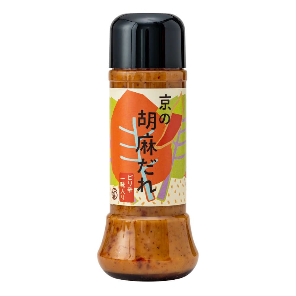 A plastic bottle of sesame rice seasoning with a Japanese product label and black cap.