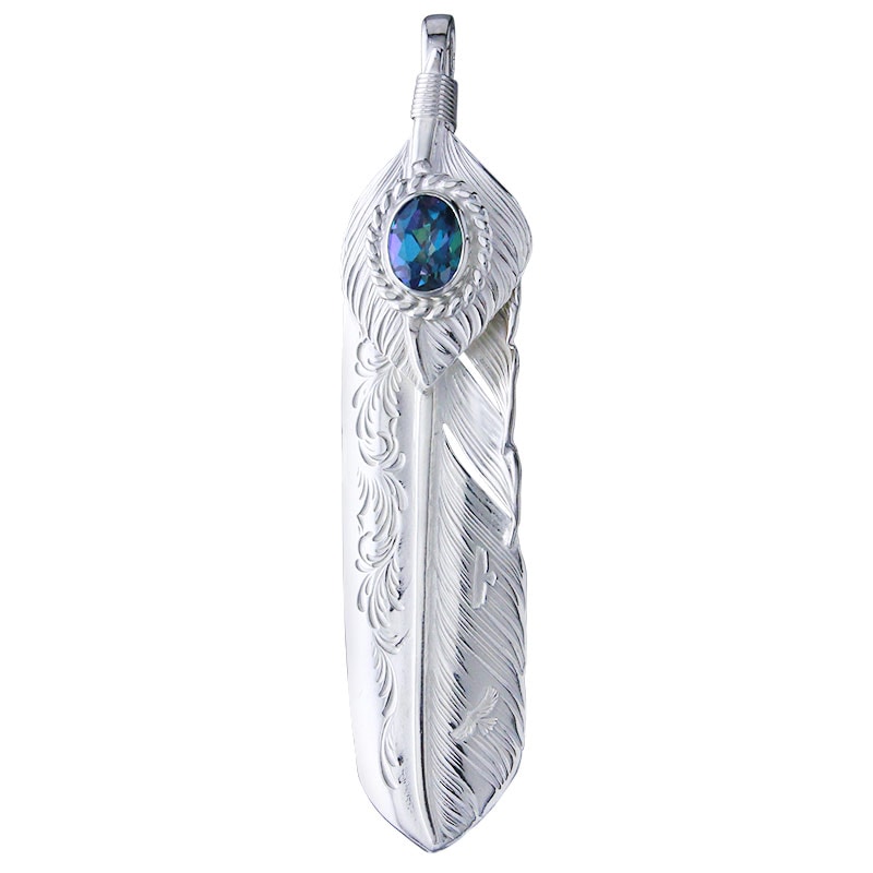 Silver feather-shaped pendant with engraved arabesque details and an oval rainbow topaz crystal set at the top.