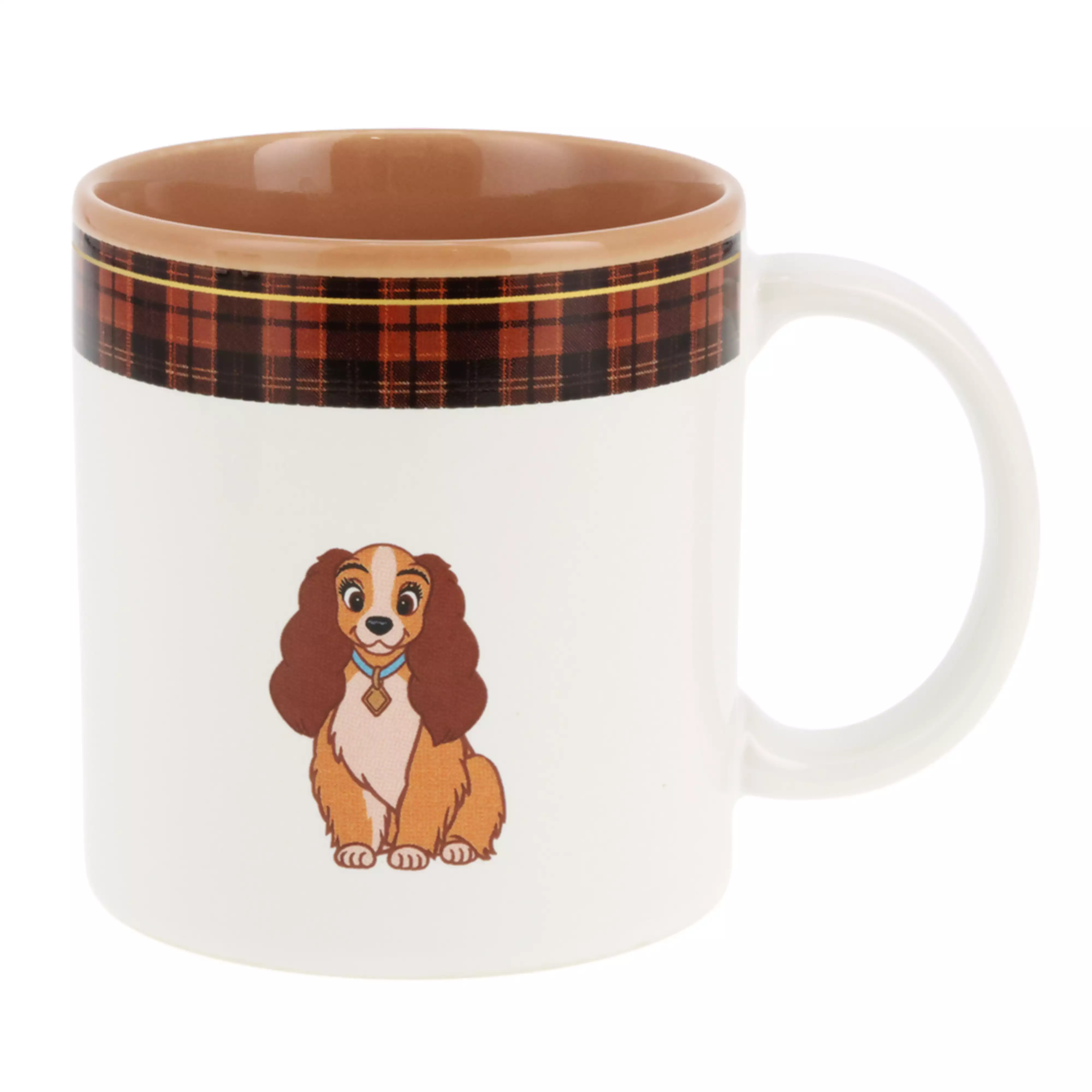 White ceramic mug with a brown interior, featuring a small cartoon dog illustration and a plaid band near the rim.