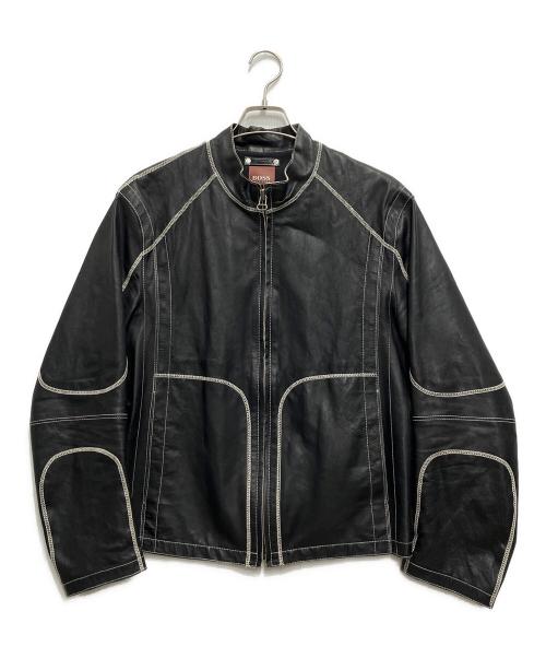 Black lambskin leather jacket with contrast stitching shown on a hanger against a white background.