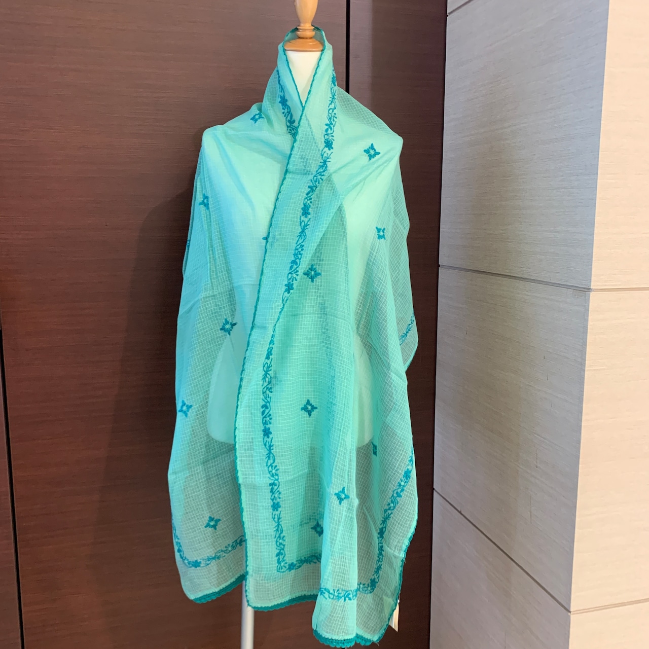 Light teal large stole (dupatta) draped on a mannequin showing full front view.
