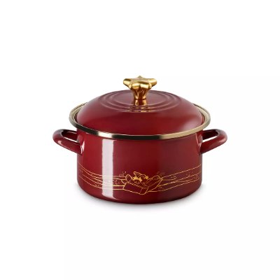 Red Le Creuset Fantasia/EOS casserole pot with lid, gold knob, and gold decorative trim on a white background.