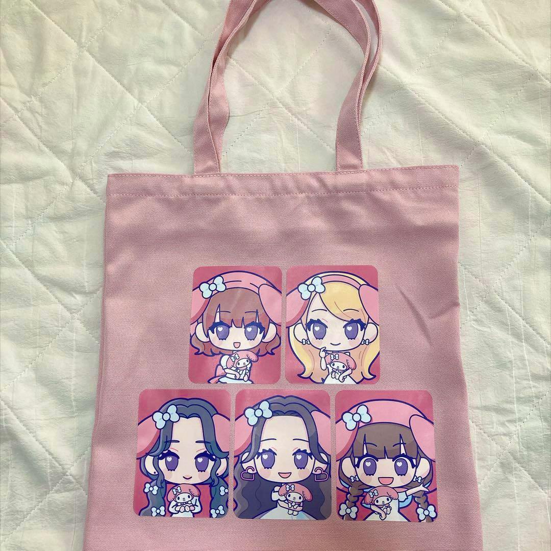 Pink polyester tote bag shown flat with five chibi character prints from the LE SSERAFIM × My Melody/Kuromi collaboration.