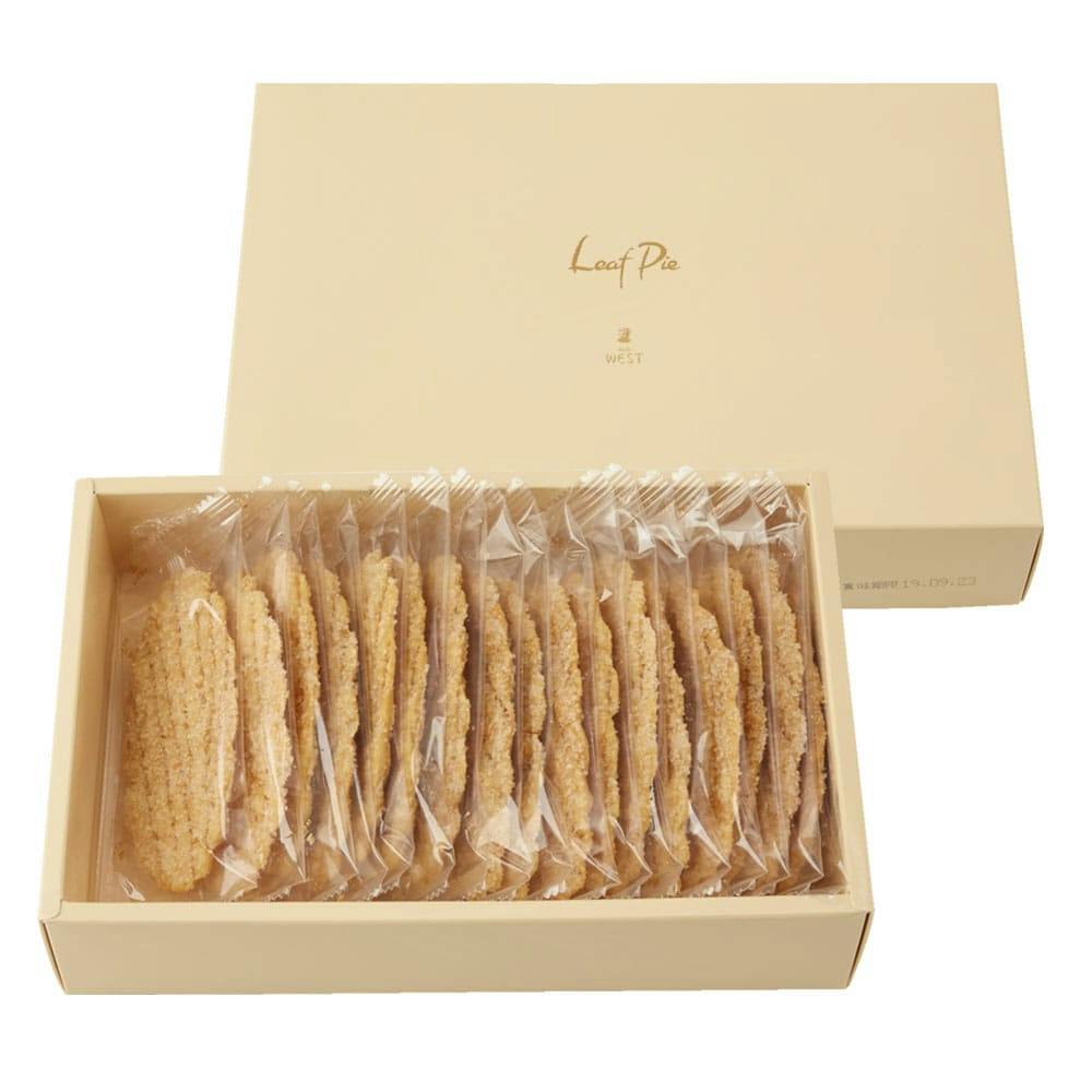 Open box of individually wrapped leaf pie cookies with the lid labeled 'Leaf Pie'.