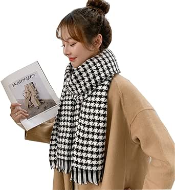 Model wearing a black-and-white checkered tassel scarf draped around her neck while holding a magazine.