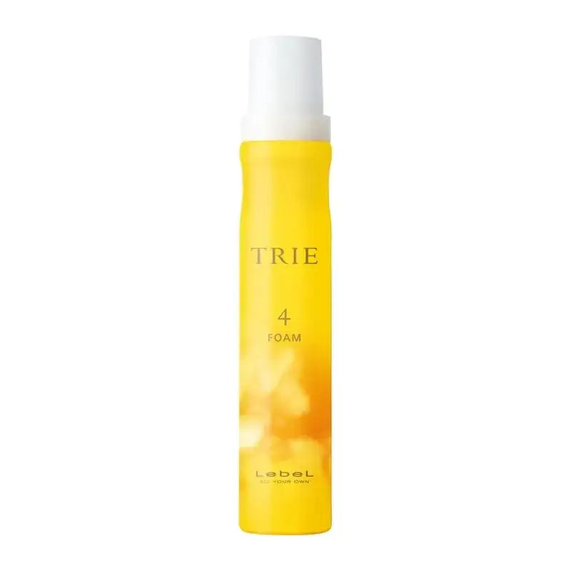 Front view of a yellow bottle labeled "TRIE 4 FOAM" hair styling foam.