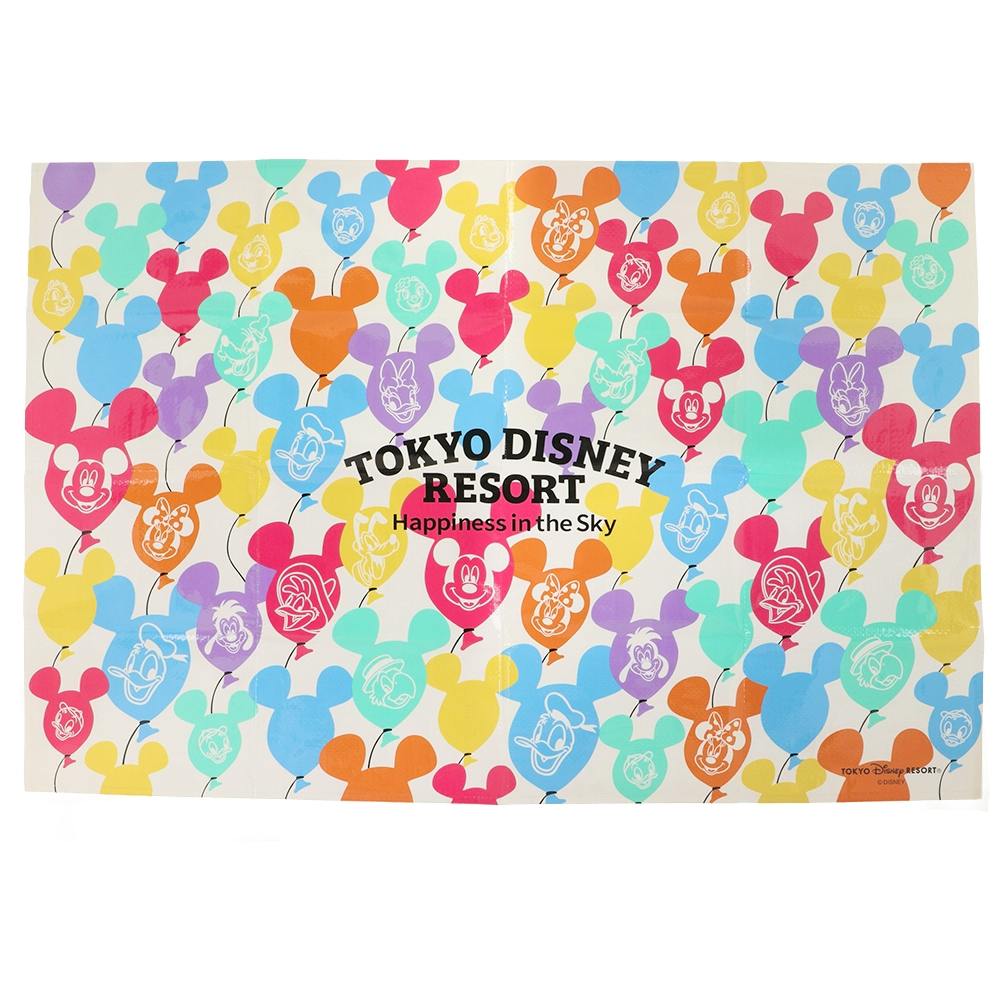 A colorful leisure sheet printed with multicolored Mickey-head balloon shapes and the text "TOKYO DISNEY RESORT Happiness in the Sky."