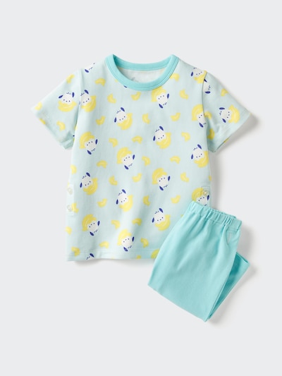 Flat-lay of a children's cotton short-sleeve pyjama set with a patterned light-blue top and matching shorts on a white background.