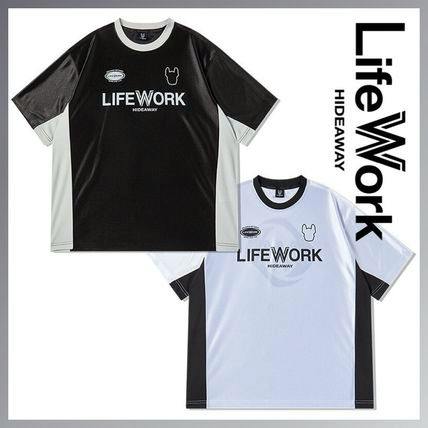Two short-sleeve polyester T-shirts, one black and one white, both with LIFEWORK logo and contrasting side panels shown flat.