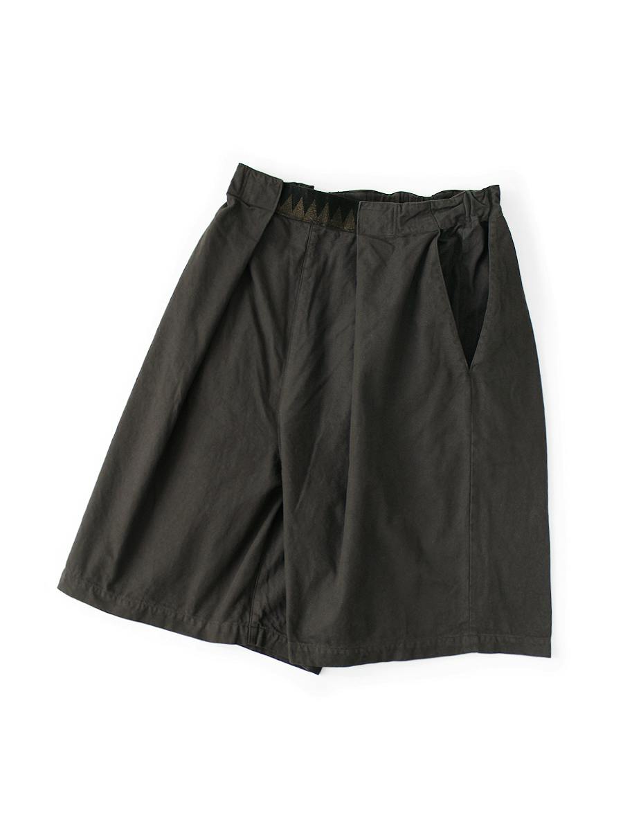 Flat-lay photo of men's cotton shorts in a dark color on a white background.