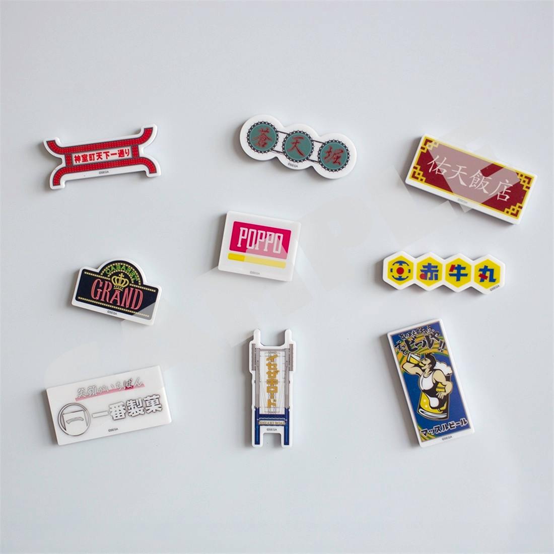 Nine acrylic fridge magnets from the '龍が如く' signboard collection arranged on a white surface.