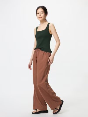 Woman modeling the women's rayon pants with a drawstring waist.