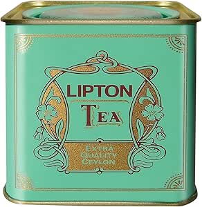 Green metal tin of Lipton Black Tea Extra Quality Ceylon with decorative gold detailing.