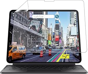 An iPad Pro 13-inch with a transparent anti-glare protective film partially peeled back, displayed on a keyboard case.