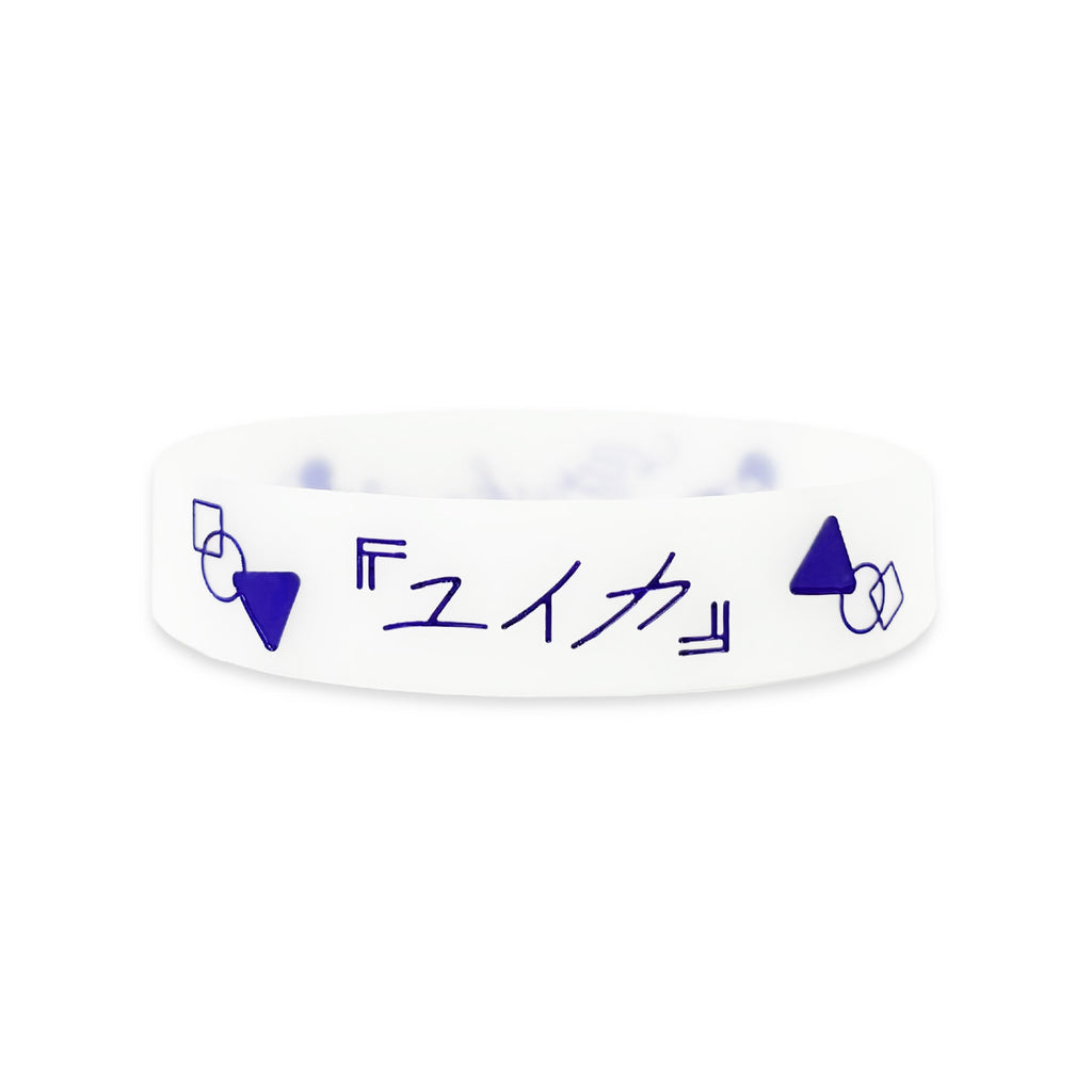 White logo rubber band with royal blue geometric shapes and stylized text printed around its exterior.