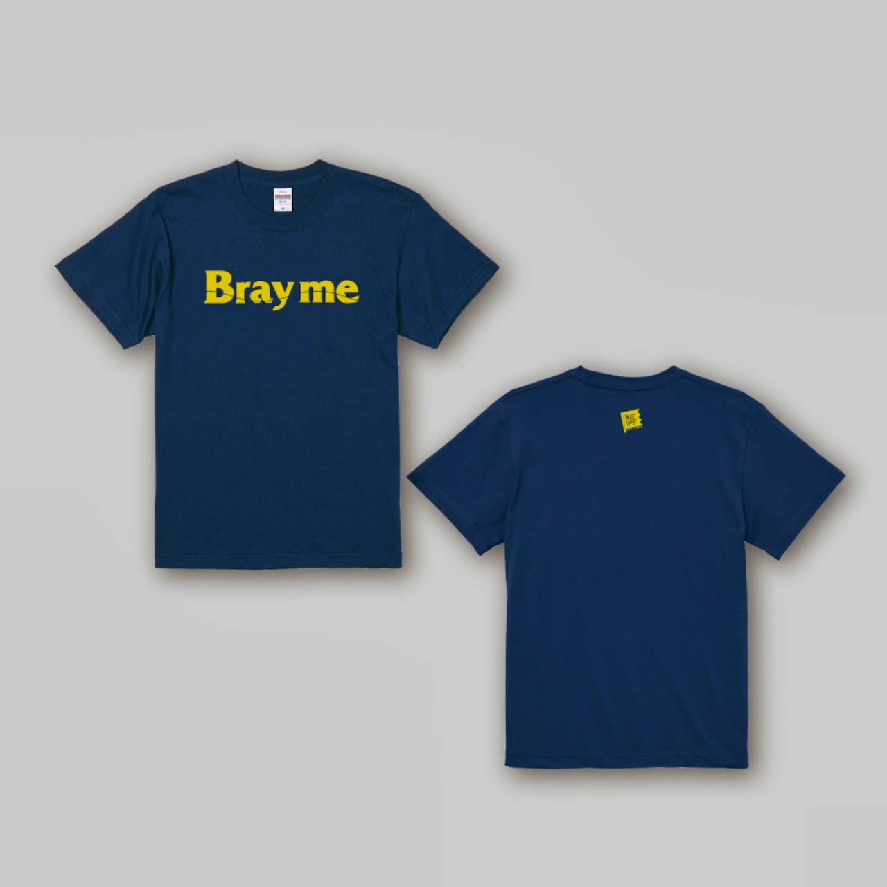 Flat-lay of a navy T-shirt showing front with a yellow "Bray me" logo and the back with a small yellow tag near the neckline.