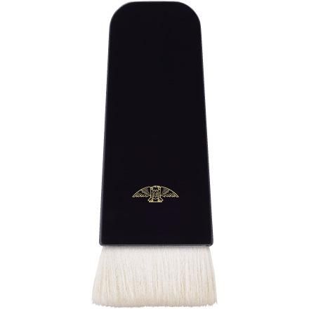 A long-handled black flat makeup brush with short white bristles and a small gold logo on the handle.