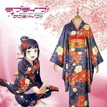 Photograph of a dark blue floral kimono costume displayed on a mannequin alongside an anime character illustration.