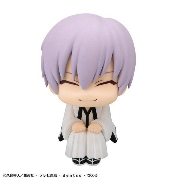 Front-facing chibi-style plastic figure of Gin Ichimaru from BLEACH with lavender hair, closed eyes, and a white outfit.