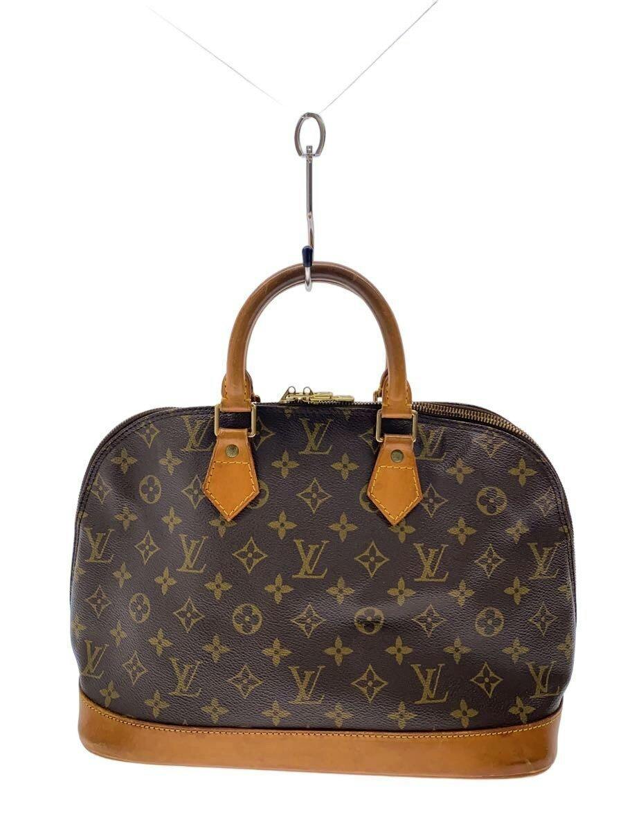 Front view of a brown Louis Vuitton monogram canvas Alma bag with tan leather handles and base on a white background.