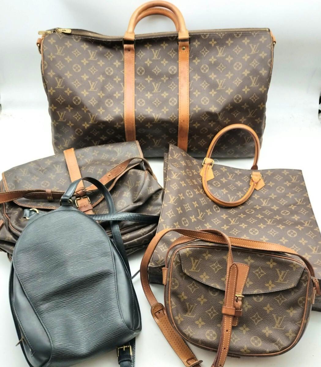 Five Louis Vuitton monogram canvas bags from a 5-piece set arranged together on a white background.