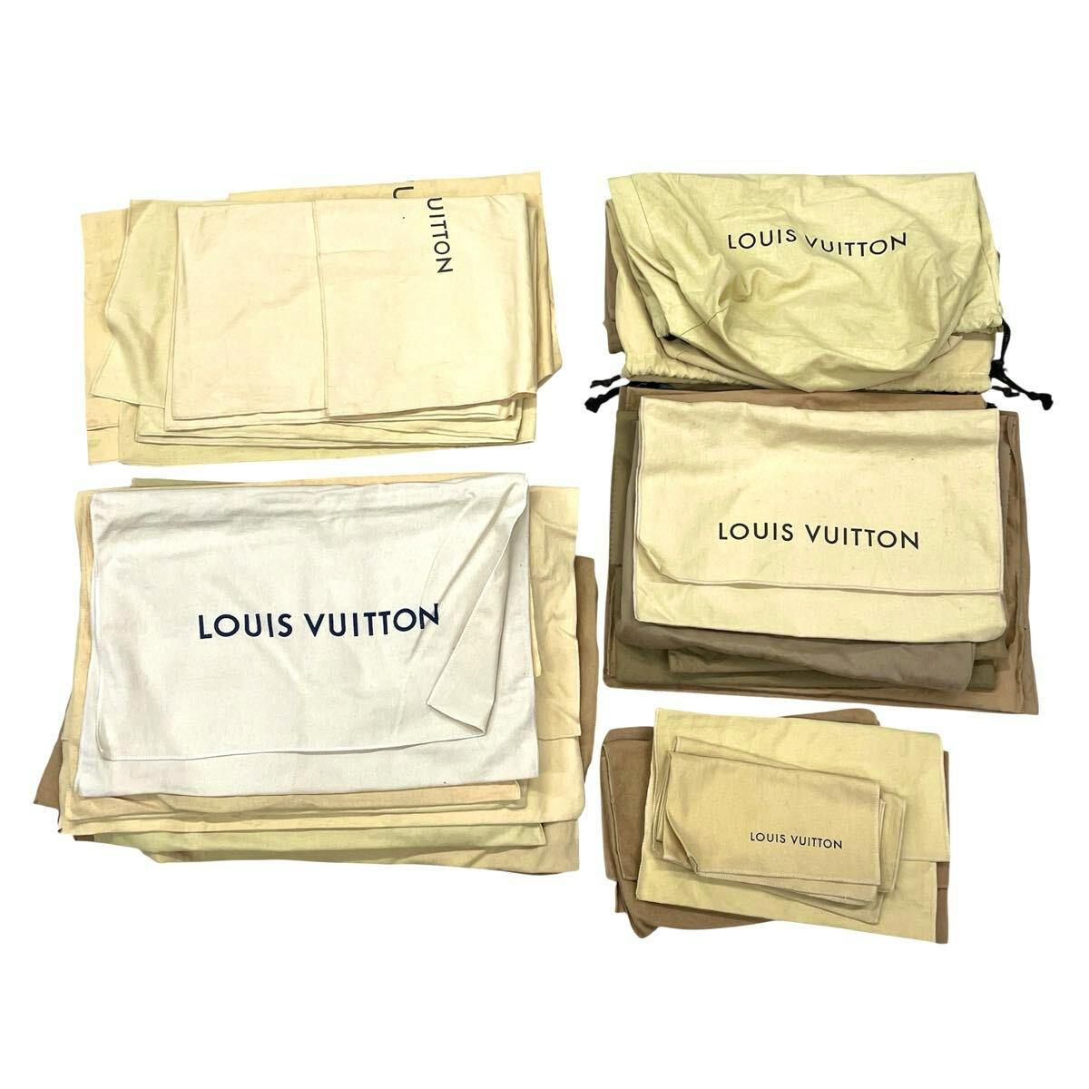 A variety of folded Louis Vuitton dust bags and pouches in different sizes arranged on a white background.