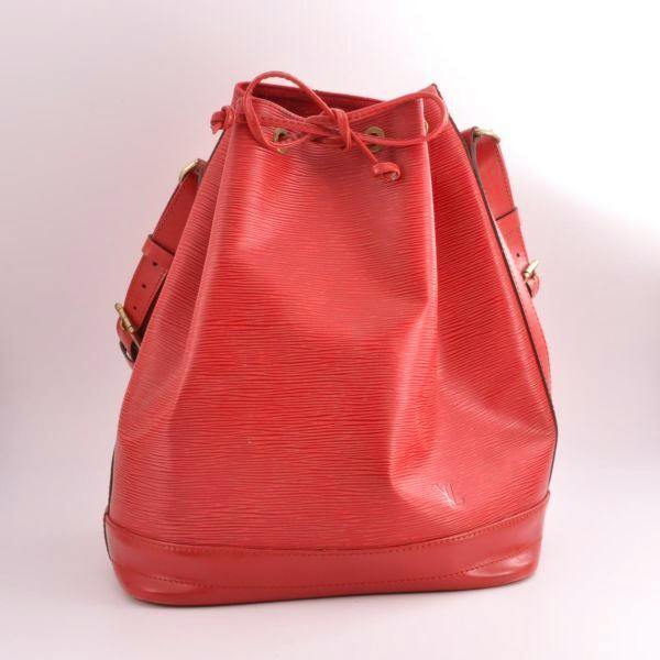 Front view of a red Louis Vuitton Epi Noé M44007 drawstring shoulder bag in Castilian red leather.
