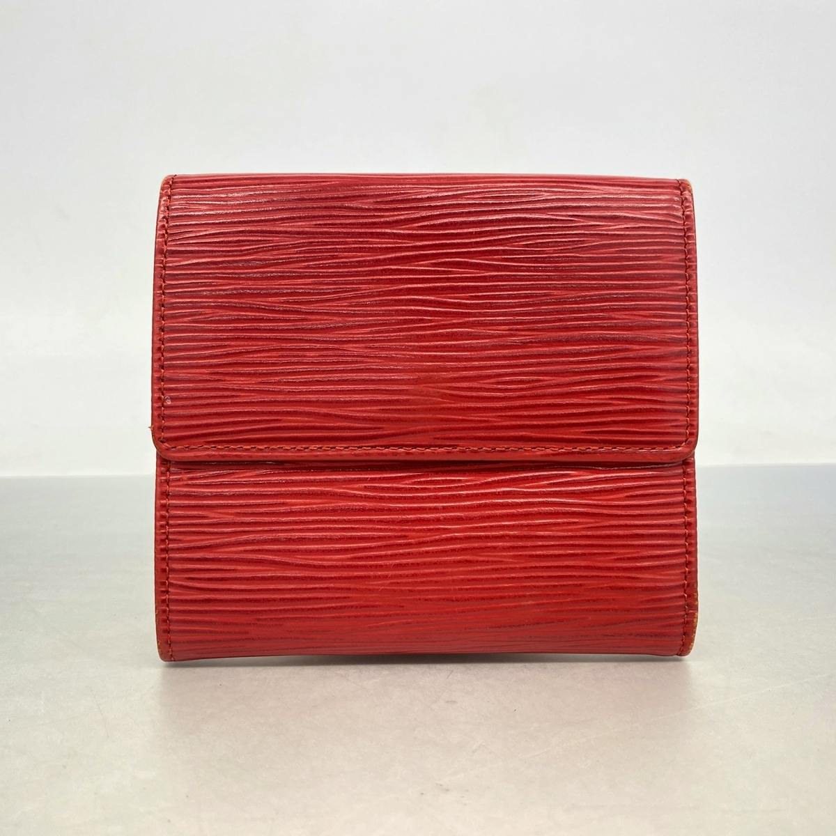 Closed front view of a red Louis Vuitton Epi tri-fold wallet.