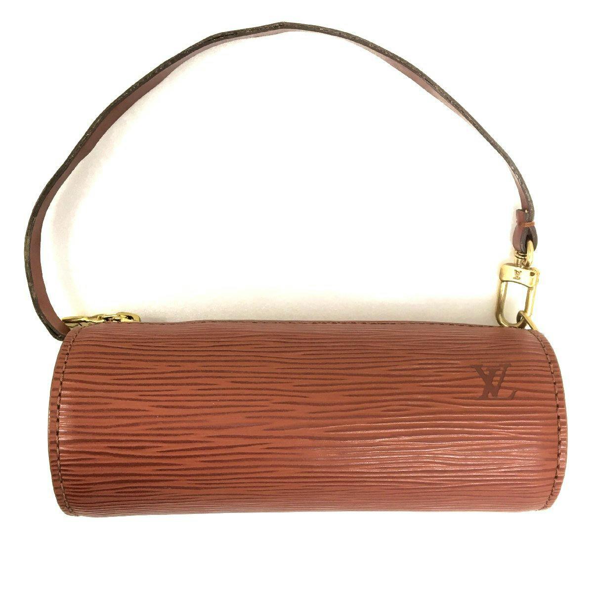 Brown Louis Vuitton Épi leather cylindrical mini pouch (M52223) with a top zipper, single strap, and gold hardware on a white background.