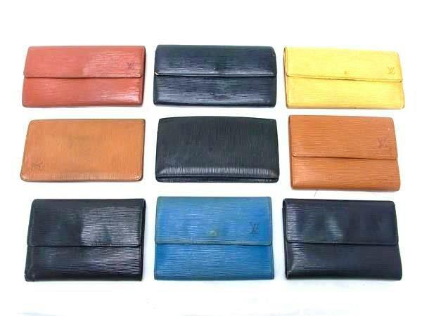 Nine Louis Vuitton Epi leather wallets in various colors arranged in three rows on a white background.
