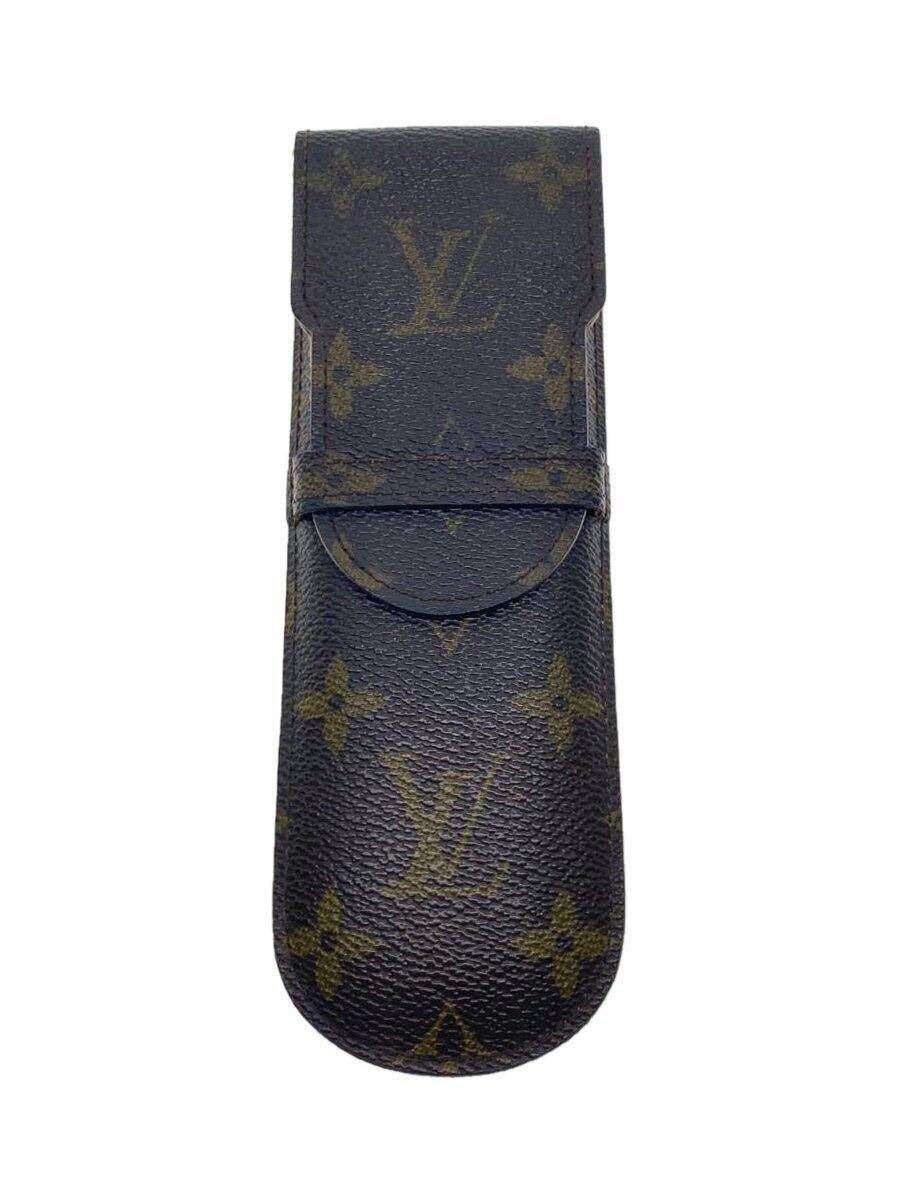 Closed Louis Vuitton monogram canvas etui (pen case) in brown shown on a white background.