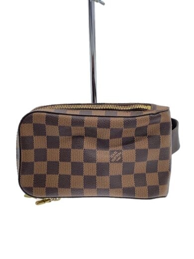 Front view of a brown checkered leather waist bag with a top zipper on a display stand.