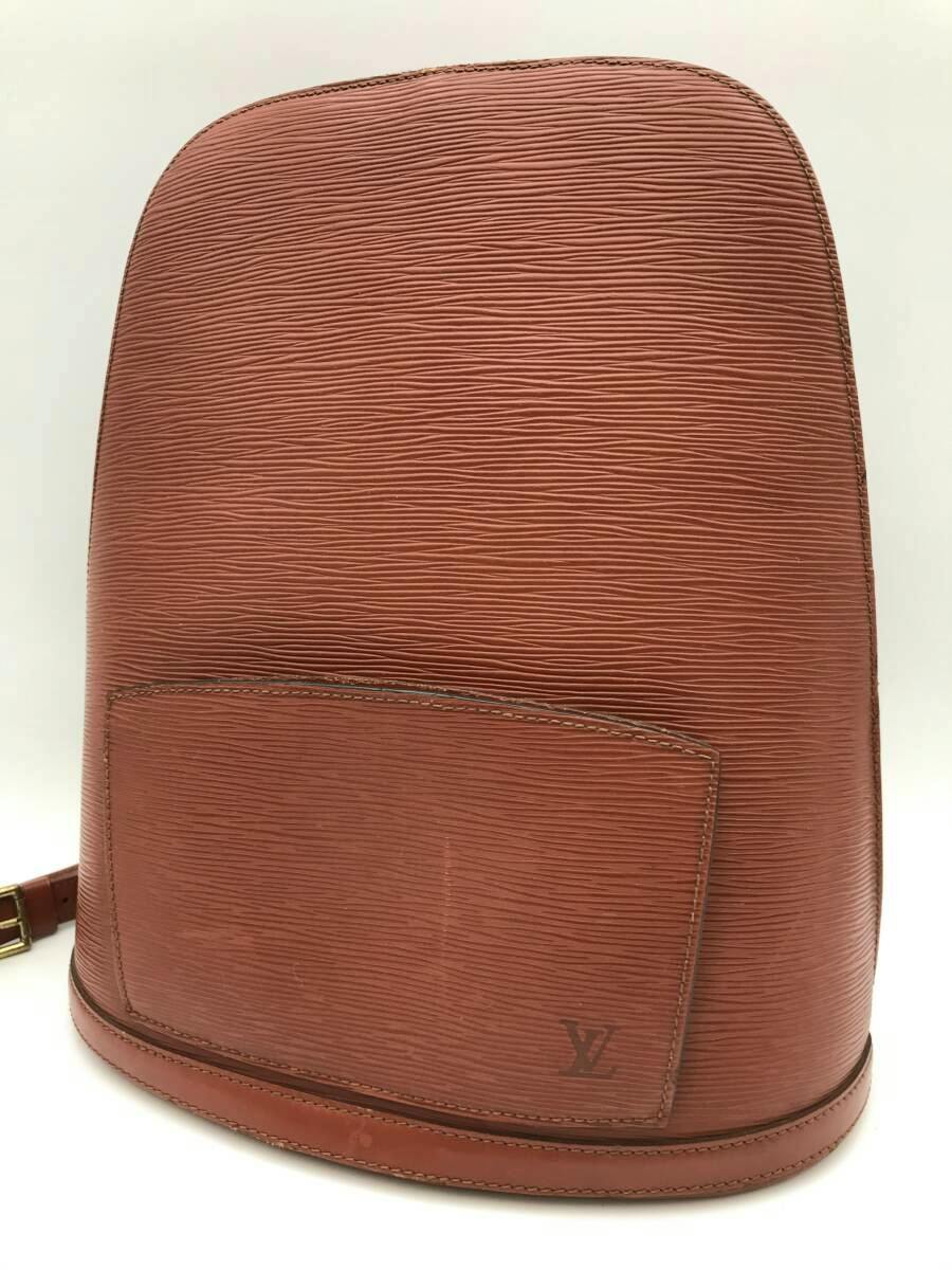 Front view of a brown Louis Vuitton Epi leather backpack showing the textured leather, front pocket, and LV logo.
